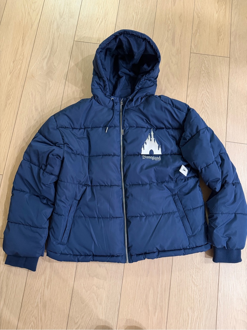 Disneyland Navy Puffer Jacket with Silver Castle Graphic